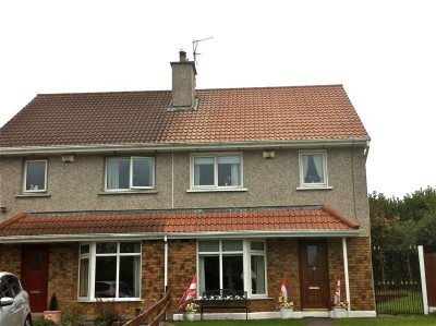 After cleaning the tiled roof of a semi-detached house in Cork by Pro Wash, Ireland