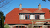 House after tile cleaning using the latest soft washing techniques. The roof is now sterilised - inhibiting future discolouration or growth of moss and algae.